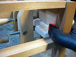 Clamping drawer guides in nightstand