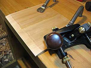 Beveling drawer bottom with skew rabbet plane