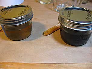 Shellac flakes dissolving in mason jars