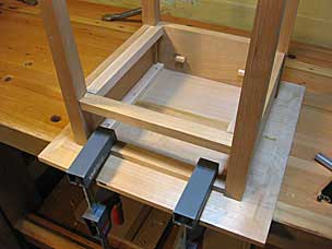 Attaching top to base of nightstand