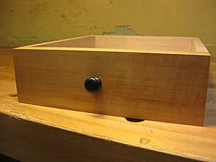 Nightstand drawer with pull installed