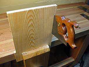 Cutting notches in end board of six board chest