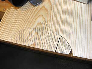 Sawing ogee for six board chest feet