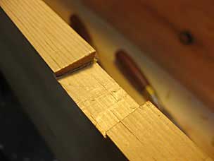 Notch for strap hinge