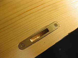 Lock strike in six board chest lid