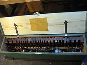 Six board chest with tool collection