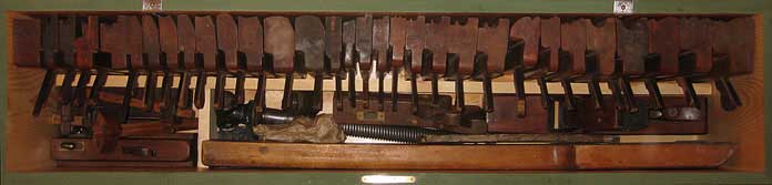 Six board chest with tool collection