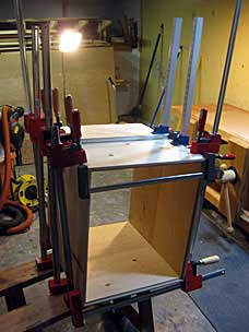 Gluing drill press cabinet dovetails