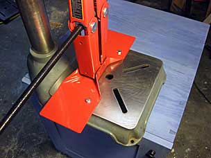 Scissor jack on drill press base