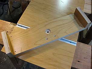 Riser to attach drill press table to jack