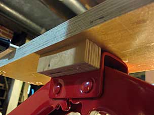 Drill press table riser attached to jack