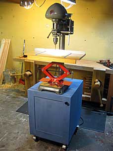 Drill press cabinet and table