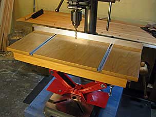 Auxiliary drill press table