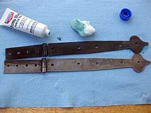 Strap hinges in first application of cold bluing paste