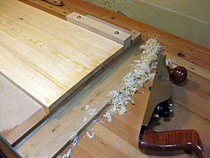 Shooting end of yellow pine board for boarded chest