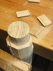 Chiseling tenon on leg for worktable