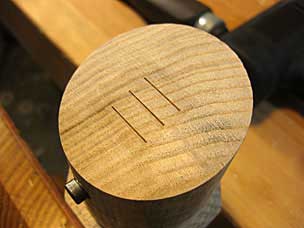 Identification number on end of tenon