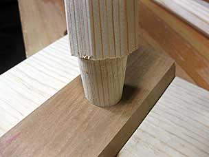 Testing fit of tapered mortise and tenon