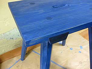 Staked stool with blue milk paint and boiled linseed oil