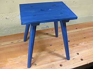 Staked stool with blue milk paint and boiled linseed oil