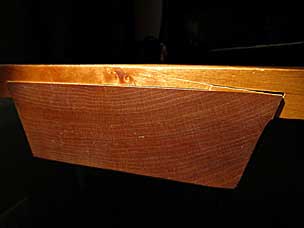 Crack in top at sliding dovetail with batten